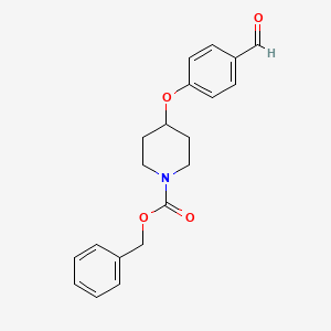 molecular formula C20H21NO4 B1366682 Benzyl 4-(4-formylphenoxy)piperidine-1-carboxylate 