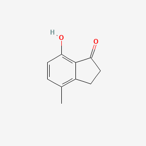 B1367055 7-Hydroxy-4-methyl-1-indanone CAS No. 67901-82-0