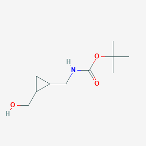 molecular formula C10H19NO3 B13671007 tert-butyl N-[[2-(hydroxymethyl)cyclopropyl]methyl]carbamate 