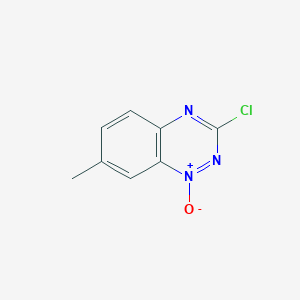 B1367242 1,2,4-Benzotriazine, 3-chloro-7-methyl-, 1-oxide CAS No. 54448-50-9