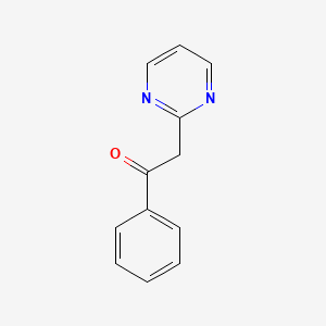 B1367315 1-Phenyl-2-(pyrimidin-2-yl)ethanone CAS No. 82820-30-2