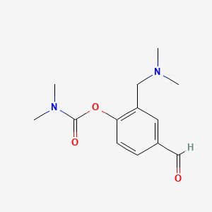 molecular formula C13H18N2O3 B13675791 2-[(Dimethylamino)methyl]-4-formylphenyl Dimethylcarbamate 