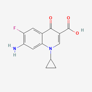 molecular formula C13H11FN2O3 B1367596 7-Amino-1-cyclopropyl-6-fluoro-4-oxoquinoline-3-carboxylic acid 