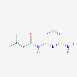 molecular formula C10H13N3O B13678213 N-(6-aminopyridin-2-yl)-3-methylbut-2-enamide 