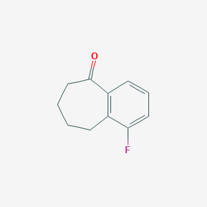 molecular formula C11H11FO B13681048 1-Fluoro-6,7,8,9-tetrahydro-5H-benzo[7]annulen-5-one 