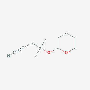 molecular formula C11H18O2 B13688698 2-[(2-Methyl-4-pentyn-2-yl)oxy]tetrahydro-2H-pyran 