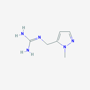 molecular formula C6H11N5 B13690646 1-[(1-Methyl-5-pyrazolyl)methyl]guanidine 