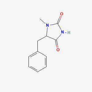 molecular formula C11H12N2O2 B13695160 5-Benzyl-1-methylimidazolidine-2,4-dione 