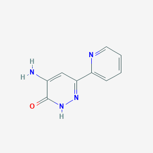 molecular formula C9H8N4O B1369647 4-Amino-6-(pyridin-2-yl)pyridazin-3-ol 