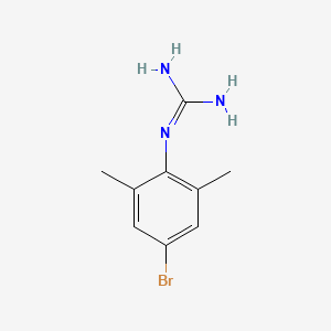 molecular formula C9H12BrN3 B13696725 1-(4-Bromo-2,6-dimethylphenyl)guanidine 