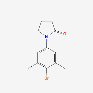 molecular formula C12H14BrNO B13696734 1-(4-Bromo-3,5-dimethylphenyl)-2-pyrrolidinone 