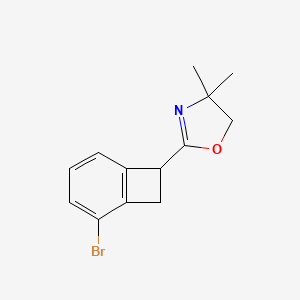 molecular formula C13H14BrNO B13696835 2-(2-Bromobicyclo[4.2.0]octa-1,3,5-trien-7-yl)-4,4-dimethyl-4,5-dihydrooxazole 