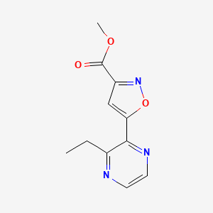 molecular formula C11H11N3O3 B13696951 Methyl 5-(3-Ethyl-2-pyrazinyl)isoxazole-3-carboxylate 