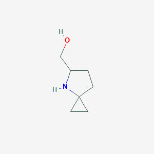 molecular formula C7H13NO B13698383 (S)-4-Azaspiro[2.4]heptan-5-ylmethanol 