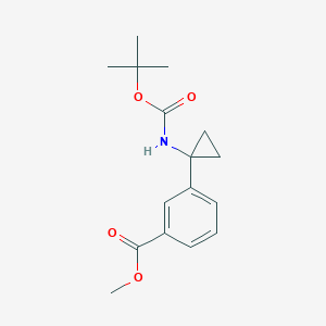 molecular formula C16H21NO4 B13699089 Methyl 3-(1-((tert-butoxycarbonyl)amino)cyclopropyl)benzoate 