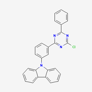 molecular formula C27H17ClN4 B13700087 9-[3-(4-Chloro-6-phenyl-[1,3,5]triazin-2-yl)-phenyl]-9H-carbazole 