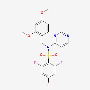 molecular formula C19H16F3N3O4S B13700120 N-(2,4-Dimethoxybenzyl)-2,4,6-trifluoro-N-(4-pyrimidinyl)benzenesulfonamide 