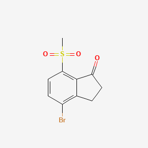 molecular formula C10H9BrO3S B13700690 4-Bromo-7-(methylsulfonyl)-1-indanone 