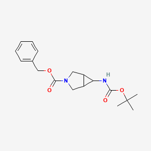 molecular formula C18H24N2O4 B13702709 6-[(Tert-butyloxycarbonyl)amino]-3-azabicyclo[3.1.0]hexane-3-carboxylic acid benzyl ester 