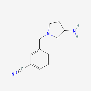 molecular formula C12H15N3 B1370497 3-[(3-Aminopyrrolidin-1-yl)methyl]benzonitrile 