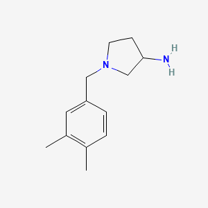 molecular formula C13H20N2 B1370499 1-[(3,4-Dimethylphenyl)methyl]pyrrolidin-3-amine 