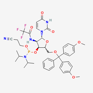 TfaNH(-2d)[N(iPr)2P(OCH2CH2CN)(-3)][DMT(-5)]Ribf(b)-uracil-1-yl