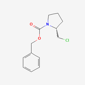 molecular formula C13H16ClNO2 B1370650 (R)-Benzyl 2-(chloromethyl)pyrrolidine-1-carboxylate CAS No. 39945-49-8