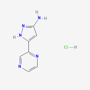 molecular formula C7H8ClN5 B13706992 3-Amino-5-(2-pyrazinyl)pyrazole Hydrochloride 