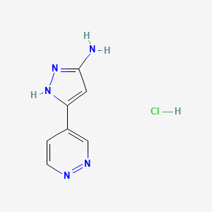 molecular formula C7H8ClN5 B13708296 3-Amino-5-(4-pyridazinyl)pyrazole Hydrochloride 