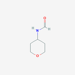 molecular formula C6H11NO2 B13708882 N-(tetrahydro-2H-pyran-4-yl)Formamide 