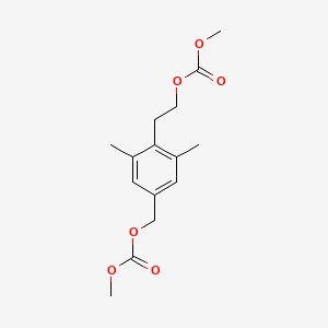 molecular formula C15H20O6 B13709417 2-[4-(Methoxycarbonyloxymethyl)-2,6-dimethylphenyl]ethyl Methoxyformate 