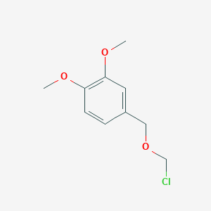 molecular formula C10H13ClO3 B13710012 4-[(Chloromethoxy)methyl]-1,2-dimethoxybenzene 