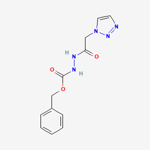 molecular formula C12H13N5O3 B13710730 N'-Cbz-2-(1H-1,2,3-triazol-1-yl)acetohydrazide 