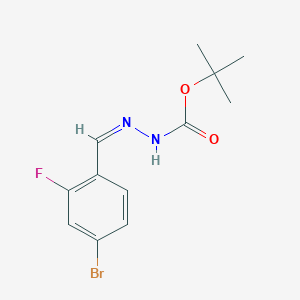 molecular formula C12H14BrFN2O2 B13712447 (E)-tert-Butyl 2-(4-bromo-2-fluorobenzylidene)hydrazinecarboxylate 