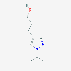 molecular formula C9H16N2O B1371345 3-[1-(propan-2-yl)-1H-pyrazol-4-yl]propan-1-ol 