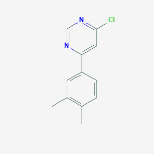 molecular formula C12H11ClN2 B1371937 4-Chloro-6-(3,4-dimethylphenyl)pyrimidine 