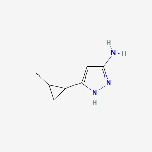 molecular formula C7H11N3 B1372338 3-(2-甲基环丙基)-1H-吡唑-5-胺 CAS No. 1187765-24-7