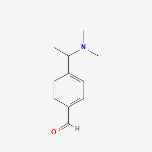 molecular formula C11H15NO B1372486 4-[1-(Dimethylamino)ethyl]benzaldehyde CAS No. 915922-29-1