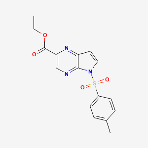 molecular formula C16H15N3O4S B13725008 Ethyl 5-Tosyl-5H-pyrrolo[2,3-b]pyrazine-2-carboxylate CAS No. 2108176-84-5