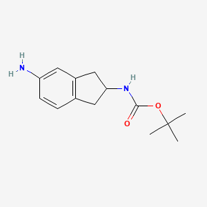 B1372741 tert-Butyl (5-amino-2,3-dihydro-1H-inden-2-yl)carbamate CAS No. 246873-45-0