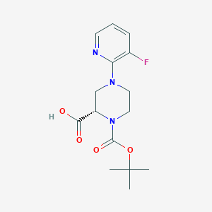 molecular formula C15H20FN3O4 B13727723 (S)-1-(tert-Butoxycarbonyl)-4-(3-fluoropyridin-2-yl)piperazine-2-carboxylic acid 