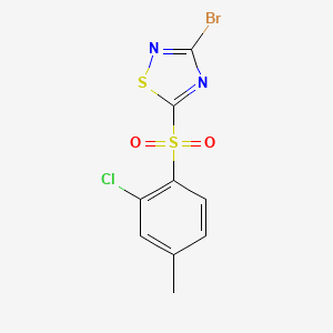 molecular formula C9H6BrClN2O2S2 B13728648 3-Bromo-5-(2-chloro-4-methylphenylsulfonyl)-1,2,4-thiadiazole 