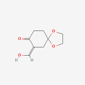 molecular formula C9H12O4 B13728711 (Z)-7-(hydroxymethylene)-1,4-dioxaspiro[4.5]decan-8-one 