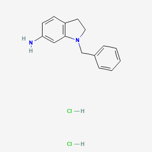 molecular formula C15H18Cl2N2 B1372895 1-Benzyl-2,3-dihydro-1H-indol-6-ylamine dihydrochloride CAS No. 1263378-73-9
