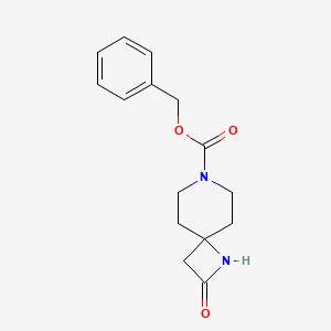molecular formula C15H18N2O3 B1373221 Benzyl 2-oxo-1,7-diazaspiro[3.5]nonane-7-carboxylate CAS No. 252720-36-8