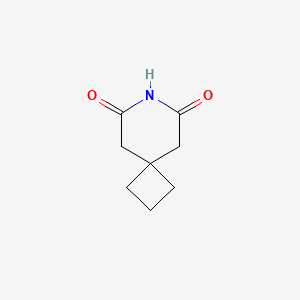 molecular formula C8H11NO2 B1373556 7-Azaspiro[3.5]nonane-6,8-dione CAS No. 1195-86-4