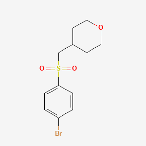 molecular formula C12H15BrO3S B1373911 4-((4-溴苯磺酰)甲基)四氢-2H-吡喃 CAS No. 1021169-67-4
