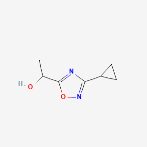 molecular formula C7H10N2O2 B1374036 1-(3-Cyclopropyl-1,2,4-oxadiazol-5-yl)ethan-1-ol CAS No. 1342181-55-8