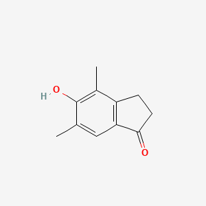 molecular formula C11H12O2 B13740391 5-Hydroxy-4,6-dimethyl-2,3-dihydro-1H-inden-1-one CAS No. 381220-71-9