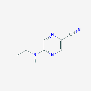 molecular formula C7H8N4 B1374177 5-(乙氨基)吡嗪-2-甲腈 CAS No. 1409987-87-6